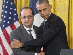 Hollande y Obama se reunieron este martes en EU para hablar sobre la campaña contra el EI. EFE / M. Reynolds