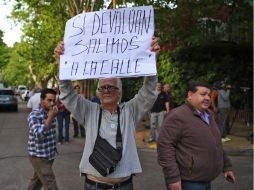 La agencia espera que el nuevo gobierno mejore el entorno económico e institucional del país en los próximos meses. AFP / E. Abramovich