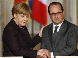 Merkel y Hollande también repasarán preparativos para cumbre sobre cambio climático. AP / F. Mori
