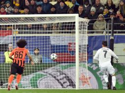 Cristiano Ronaldo, de cabeza en el 18, consiguió el primero de la gélida noche de Leópolis. AFP / S. Supinsky
