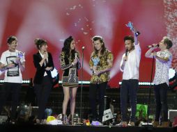 One Direction provocó llantos y suspiros al aparecer en el escenario para interpretar los temas de su nuevo álbum 'Made In The A.M'. SUN / L. Cortés