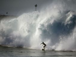 Ellos eran viajeros y amantes del surf, describen sus parejas. AFP / ARCHIVO