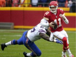 Alex Smith lanzó para 255 yardas y dos touchdowns. AP / C. Riedel