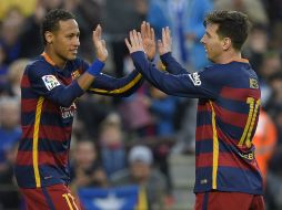 Lionel Messi y Neymar son parte del tridente 'matón' del Barcelona. AFP / L. Gene
