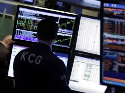 Los índices NYSE composite y Nasdaq mostraban alzas; por otro lado, el Dow Jones reporta una ligera baja. AP / ARCHIVO