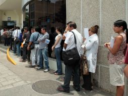 Las personas físicas terminan por pagar la factura de los corporativos, denuncia el organismo internacional. EL INFORMADOR / ARCHIVO