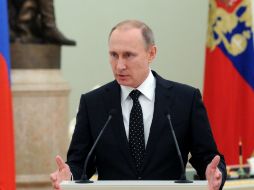 Vladimir Putin, acepta reestructurar la deuda de Kiev con Moscú con la condición de que EU o la UE garanticen su pago en el futuro. AP / ARCHIVO