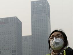 Investigadores de la universidad británica de East Anglia estiman que las emisiones pueden declinar 0.6 % este año. AP / A. Wong