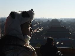 Por primera vez desde el lunes, un cielo azul y soleado sustituyó la espesa niebla. AFP / G. Baker