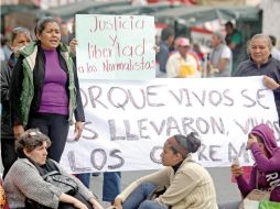 Los familiares de las normalistas se encuentran ''desconcertados'' ya que el estado y el Gobierno federal los consideró criminales. SUN / ARCHIVO