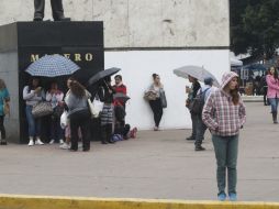 Las lluvias de este sábado sorprendieron a los tapatíos. EL INFORMADOR / R. Tamayo