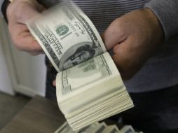 Afirma que el principal riesgo para el mercado cambiario proviene del anuncio de la política monetaria de la Fed. AP / ARCHIVO