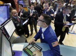 El Dow Jones se alzó, animado por la recuperación del precio del petróleo. AP / R. Drew