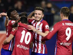 El conjunto no quería sorpresas y lo demostró con una alineación de rotaciones incluyendo a Saúl Ñíguez y Koke Resurrección. AFP / J. Soriano