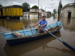 Las inundaciones en Sudamérica han obligado a miles de personas a huir de sus casas. AFP / ARCHIVO