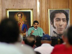 Maduro dice que la instalación del poder legislativo debe consumarse con respeto a la ley y a los poderes públicos del país. AFP /