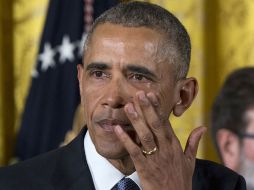 El mandatario estuvo acompañado de familiares de víctimas de este tipo de violencia. AP / C. Kaster