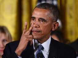 Obama recordó a las víctimas de los tiroteos en su país, donde circulan más de 300 millones de armas. AFP / J. Watson