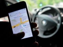 La polémica aplicación comenzó a operar en Montevideo el 21 de noviembre sin autorización. AFP / ARCHIVO