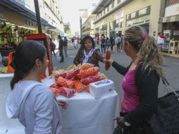 Aunque esta medida es nueva para los vendedores ambulantes del Centro, algunos muestran esperanza ante la llegada de los permisos. EL INFORMADOR / F. Atilano