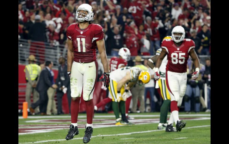 Larry Fitzgerald celebra el triunfo de su equipo, los Cardenales. AP / M. Chow
