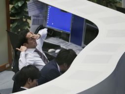 Los índices Nasdaq y Dow Jones reportaron bajas durante las últimas operaciones de la semana pasada. AP / K. Sasahara