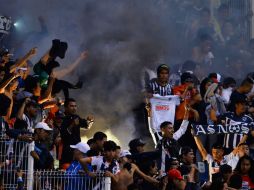 En el partido ante Puebla, aficionados del Monterrey destrozaron butacas del estadio Cuauhtémoc. MEXSPORT / ARCHIVO