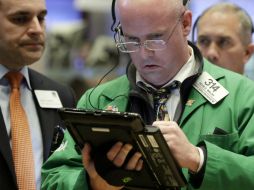 Al final las caídas no fueron tan fuertes porque los inversores remontaron gran parte de las pérdidas y el Nasdaq se cotizó positivo. AP / R. Drew