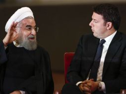 El presidente iraní, Hasán Ruhaní (izq) finalizó este martes una visita de dos días a Italia. EFE / A. Carconi