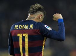 Pese a todo, Neymar vive el mejor momento deportivo de su carrera dentro del temido 'tridente' azulgrana. AFP / L. Gene