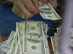 El tipo de cambio para solventar obligaciones en moneda extranjera pagaderas en la República Mexicana es de 18.2906 pesos. EL INFORMADOR / ARCHIVO