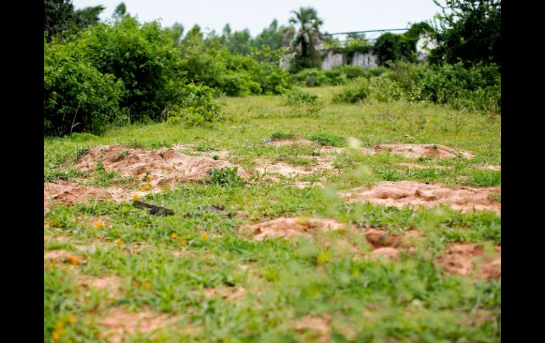 Amnistía asegura que en la zona de Buringa se muestran con claridad cinco posibles fosas comunes. AFP /
