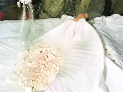 Los alucinógenos incautados iban a ser comercializados con fines de narcomenudeo en expendios. AFP / ARCHIVO