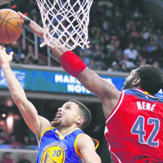Stephen Curry da cátedra ante Washington