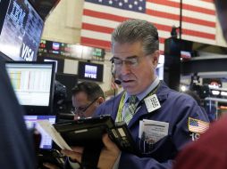 Depreciación de dólar tuvo efecto en la apertura de Wall Street. AP / R. Drew