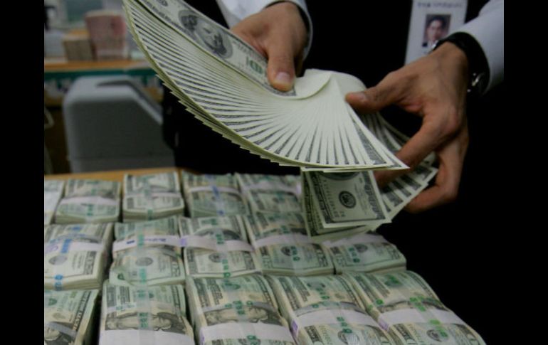El tipo de cambio para solventar obligaciones en moneda extranjera pagaderas en el país en 18.1891 pesos. EL INFORMADOR / ARCHIVO