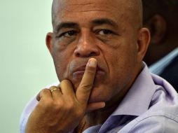 Miguel Martelly dejará el poder este domingo, sin la elección en las urnas de su sucesor. AFP / H. Retamal