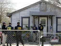 Agentes del FBI detuvieron a los funcionarios este jueves. AP / B. Owen