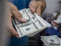 El tipo de cambio para solventar obligaciones en moneda extranjera pagaderas en la República Mexicana es de 18.7818 pesos. EL INFORMADOR / ARCHIVO