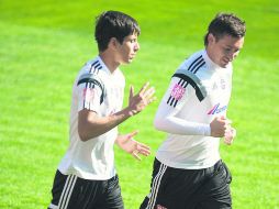 Jürgen Damm (izq), acompañado por Fernando Fernández en la práctica de los Tigres. MEXSPORT /