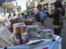 La modificación cambia de 'prohibido' a 'restringido' ejercer esta actividad comercial en el primer cuadro de la ciudad. EL INFORMADOR / ARCHIVO
