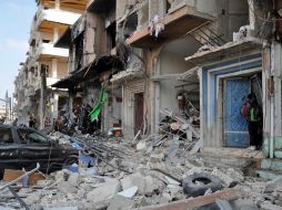 Los atentados parecían haber causado grandes daños materiales, destrozando coches y minibuses. EFE /