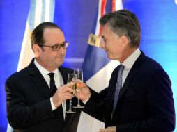 El presidente francés, Francois Hollande y su homólogo argentino, Mauricio Macri. AFP / S. de Sakutin