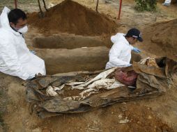 Según cifras de la fiscalía general de Colombia, se han exhumado más de mil cadáveres. AP / F. Vergara