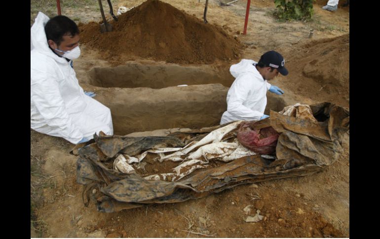 Según cifras de la fiscalía general de Colombia, se han exhumado más de mil cadáveres. AP / F. Vergara