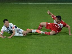 Dolido. Irving Lozano se queja de un golpe de Antonio Ríos. MEXSPORT /