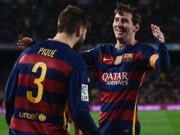 Piqué y Messi dieron la victoria al Barcelona. AFP / J. Lago