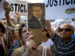 La investigación oficial de su muerte aún no ha determinado si se trató de un suicidio, un suicidio inducido o un homicidio. AP / ARCHIVO