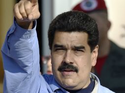 Maduro repitió el lema oficial de 'aquí no se rinde nadie' y reiteró que la oposición sigue impulsado la guerra económica. AFP / J. Barreto