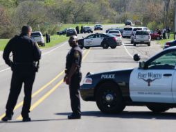 La balacera sobrevino poco después de las 14:00 horas luego de que los agentes persiguieran un automóvil. AP / L. Jenkins / The Dallas Morning News